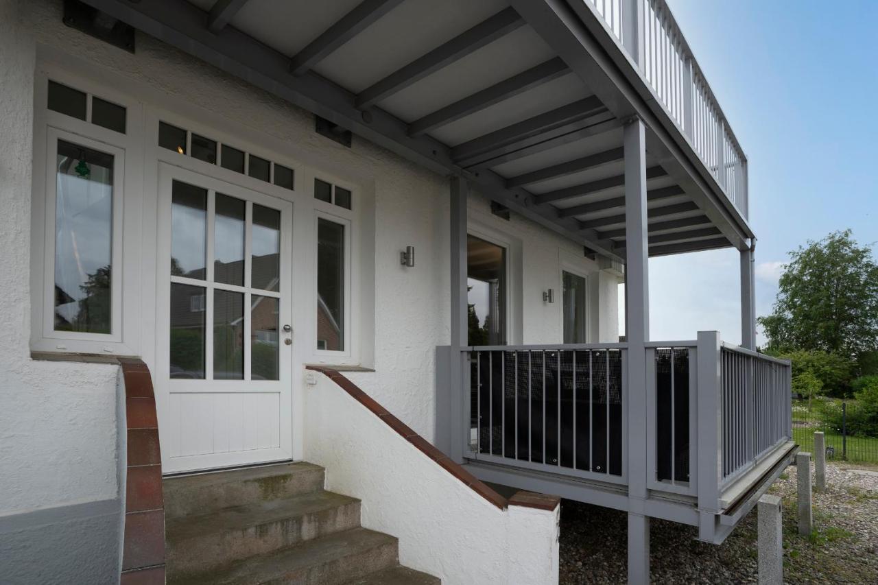 Appartamento Haus Waldfrieden Ferienhaeuschen Waldfrieden Haffkrug Esterno foto