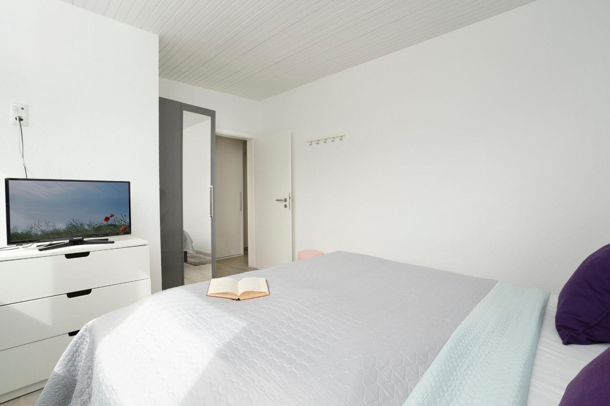 Appartamento Haus Waldfrieden Ferienhaeuschen Waldfrieden Haffkrug Esterno foto