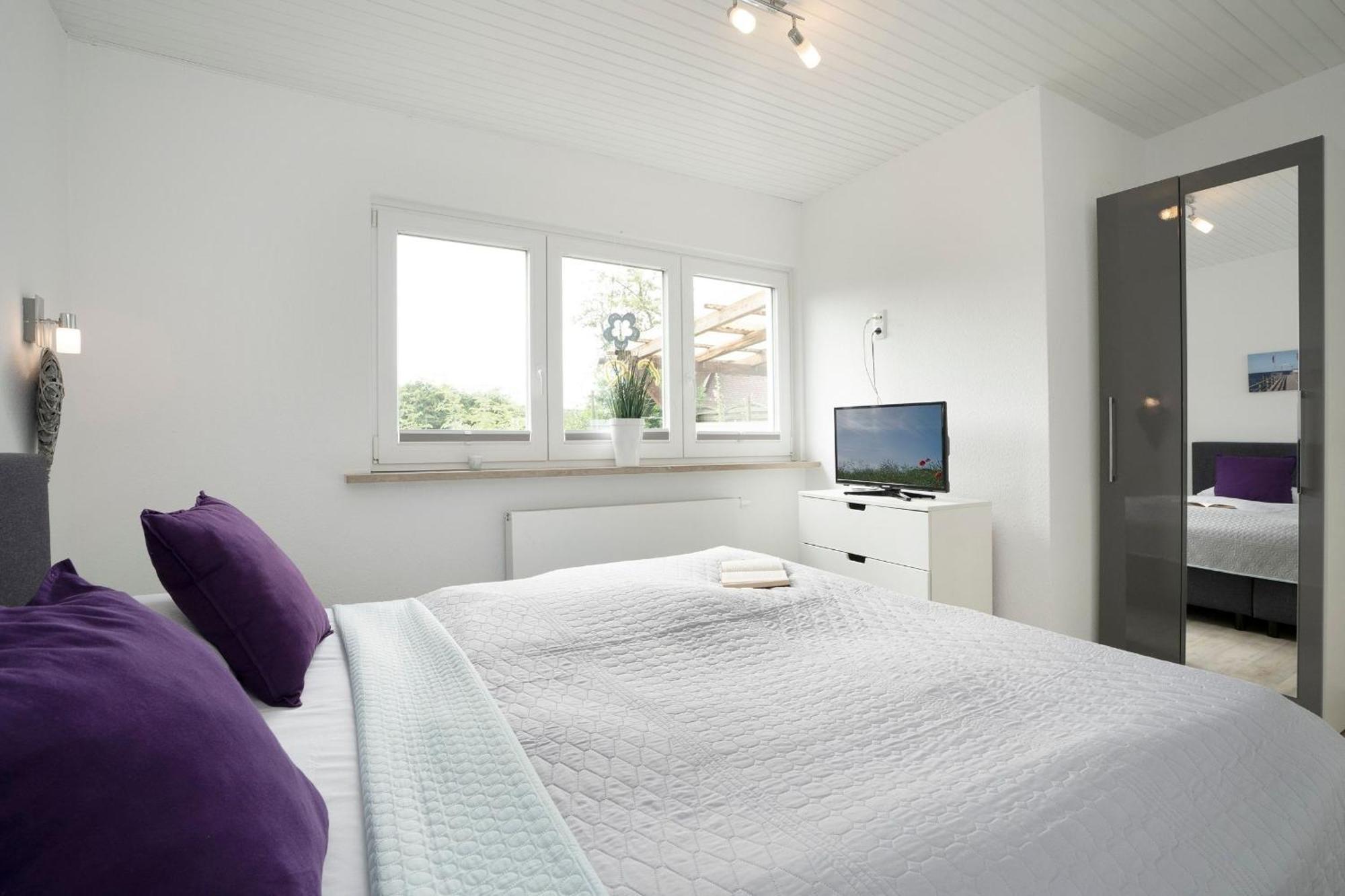 Appartamento Haus Waldfrieden Ferienhaeuschen Waldfrieden Haffkrug Esterno foto